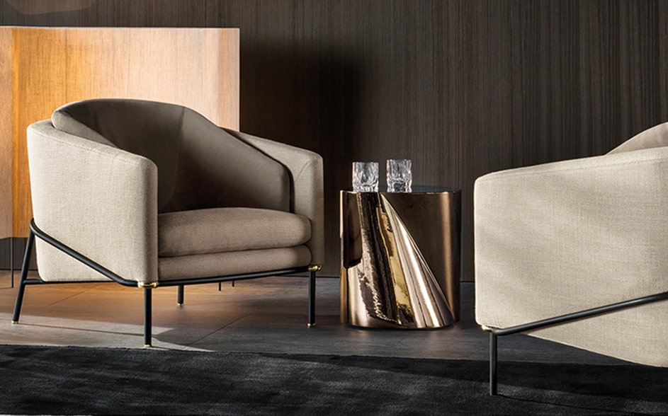 modern-armchair-next-to-gold-coffee-table