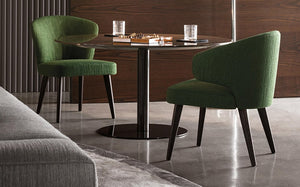 two-modern-dining-chairs-at-the-round-dining-table