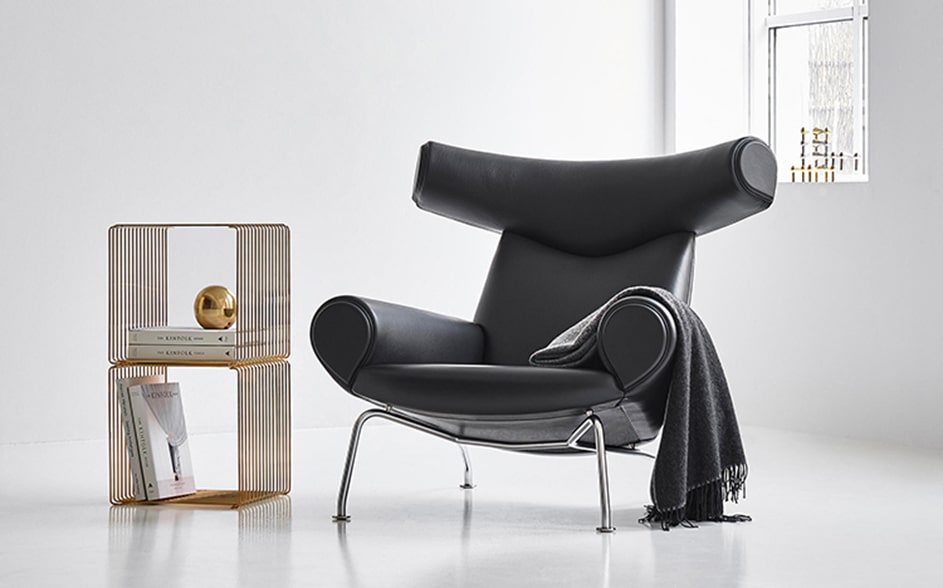 black-designer-armchair-with-blanket