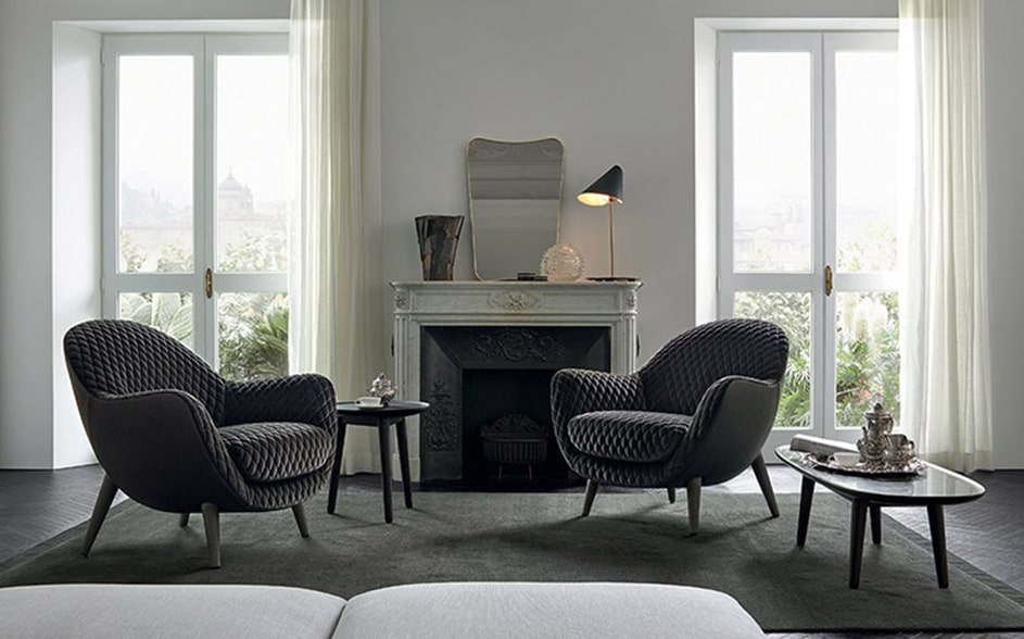 two-Grey--modern-armchairs-by-fireplace