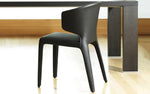 Load image into Gallery viewer, black-leather-dining-chair-next-to-table
