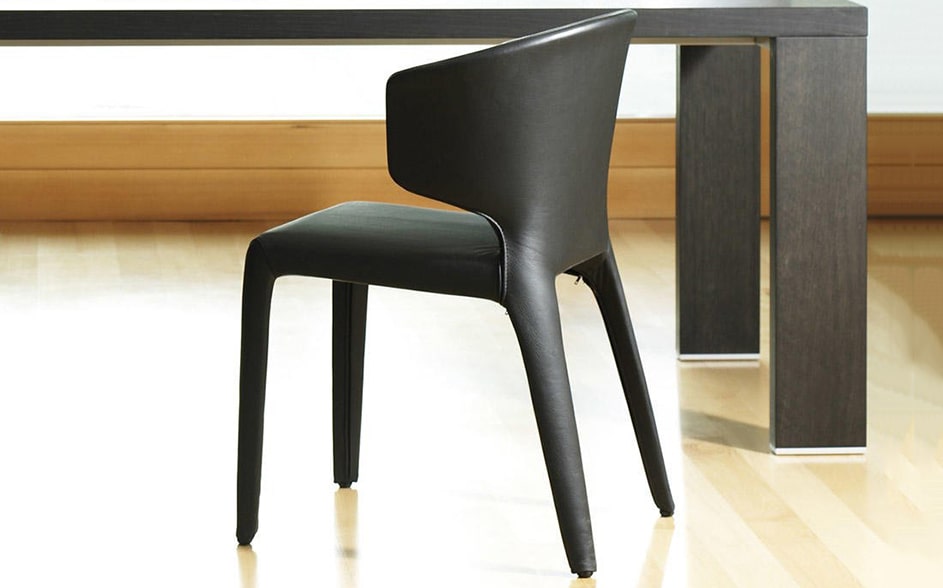 black-leather-dining-chair-next-to-table