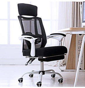 Ergonomic office chair by table