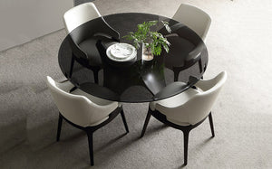 round-dining-table-in-interior-with-chairs