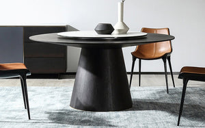 round-dining-table-with-leather-chairs-in-interior